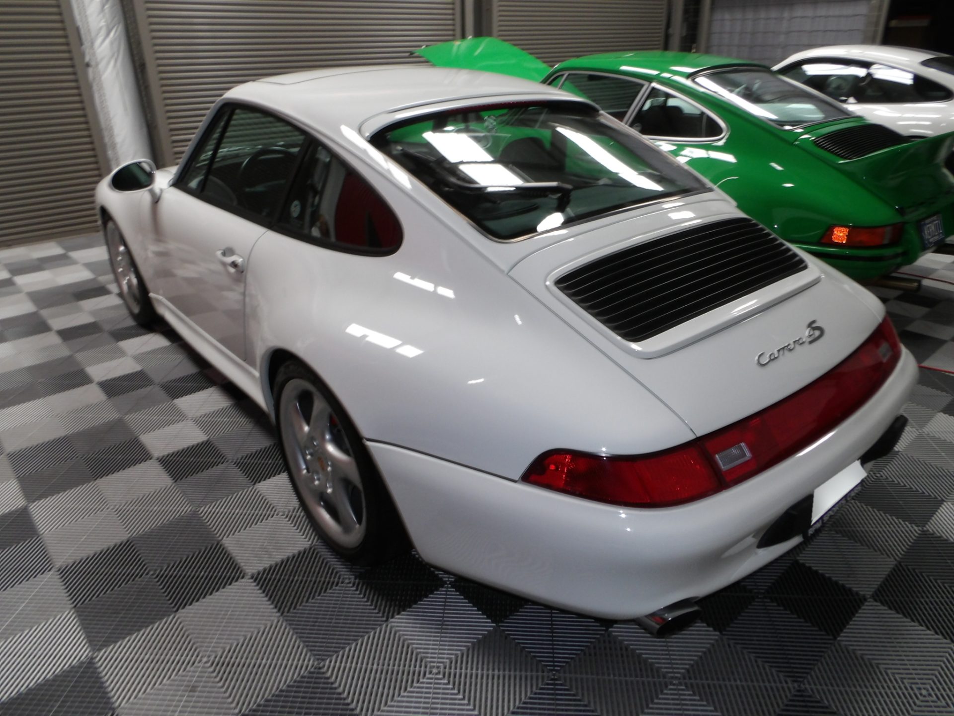 Porsche 911 Carrera 4S in a Houston garage